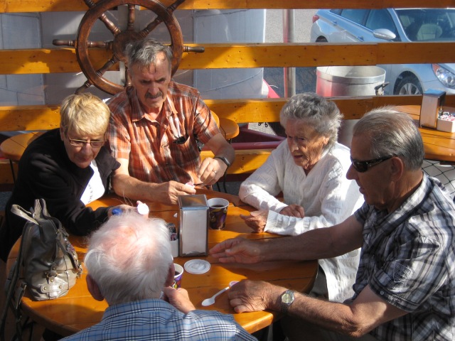 Marie-Anne, Andre, Alexina, Paul and Landry Smith enjoying "guedilles aux crabe" at the Casse-Croûte on the wharf in Sept-Îles, Quebec